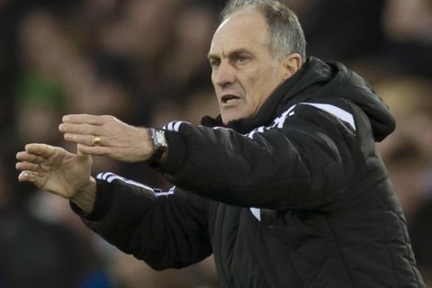 FILE - In this Sunday Jan. 24, 2016 file photo Swansea Citys manager Francesco Guidolin issues instructions during the English Premier League soccer match between Everton and Swansea at Goodison Park Stadium, Liverpool, England. Bob Bradley has become the first American manager of a Premier League club after being hired by Swansea City while announcing on Monday Oct. 3, 2016 it had fired Francesco Guidolin. (AP Photo/Jon Super, File)