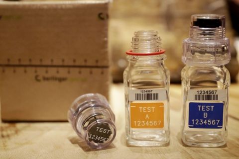 The latest Berlinger Special BEREG-Kit for human urine doping testing with A and B sample bottles stands posed for photographs in London, Monday, Dec. 12, 2016. World Anti-Doping Agency investigator Richard McLaren found that FSB agents tampered with samples during the 2014 Sochi Winter Olympics, leaving no sign of scratches or marks to untrained eyes. (AP Photo/Matt Dunham)