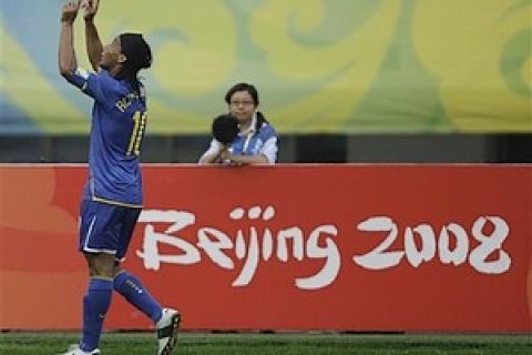 Brazil's Ronaldinho celebrates after scoring against  New Zealand during their men's Group C, first round soccer match at the Beijing 2008 Olympics in Shenyang, northeastern China's Liaoning province, Sunday, Aug. 10, 2008.(AP Photo/Martin Mejia)