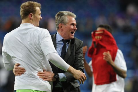 Bayern Munich's head coach Jupp Heynckes (C) celebrates with Bayern Munich's goalkeeper Manuel Neuer (L) after winning the UEFA Champions League second leg semi-final football match Real Madrid against Bayern Munich  at the Santiago Bernabeu stadium in Madrid on April 25, 2012. Manuel Neuer was the hero for Bayern Munich on Wednesday as his side went through to the Champions League final after beating Real Madrid 3-1 on penalties in the Santiago Bernabeu.
 AFP PHOTO / CHRISTOF STACHECHRISTOF STACHE/AFP/GettyImages