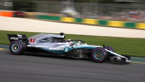 Mercedes driver Lewis Hamilton of Britain races along during qualifying at the Australian Formula One Grand Prix in Melbourne, Saturday, March 24, 2018. Hamilton has poll for Sunday's race. (AP Photo/Asanka Brendon Ratnayake)