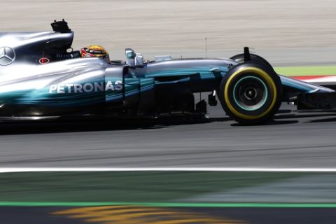 Mercedes driver Lewis Hamilton of Britain steers his car during the second free practice session for the Spanish Formula One Grand Prix at the Barcelona Catalunya racetrack in Montmelo, Spain, Friday, May 12, 2017. The F1 race will be held on Sunday. (AP Photo/Manu Fernandez)