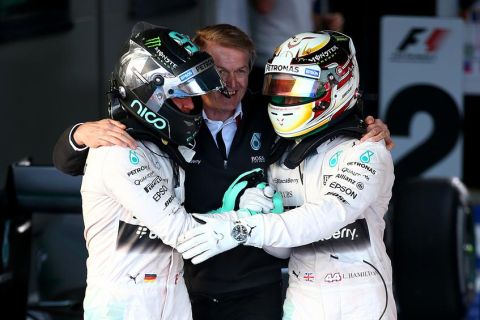 MELBOURNE, AUSTRALIA - MARCH 15:  Lewis Hamilton of Great Britain and Mercedes GP shakes hands with Nico Rosberg of Germany and Mercedes GP in Parc Ferme after winning the Australian Formula One Grand Prix at Albert Park on March 15, 2015 in Melbourne, Australia.  (Photo by Mark Thompson/Getty Images)