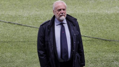 Napoli soccer club president Aurelio De Laurentis stands on the pitch during a training session, at the Parc des Princes stadium in Paris, Tuesday, Oct. 23, 2018. PSG will play against Napoli in a Champions League group C Champions League soccer match on Wednesday. (AP Photo/Thibault Camus)