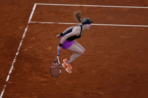 Eugenie Bouchard from Canada celebrates after defeating Maria Sharapova from Russia at the end of their Madrid Open tennis tournament match in Madrid, Spain, Monday, May 8, 2017. Bouchard won 7-5, 2-6 and 6-4. (AP Photo/Francisco Seco)