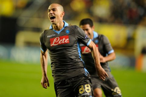 Napoli's Swiss midfielder Gokhan Inler celebrates after scoring during the UEFA Champions League second leg football match between Villarreal and Napoli at the Madrigal Stadium in Villarreal on December 07, 2011. AFP PHOTO/ JOSE JORDAN (Photo credit should read JOSE JORDAN/AFP/Getty Images)