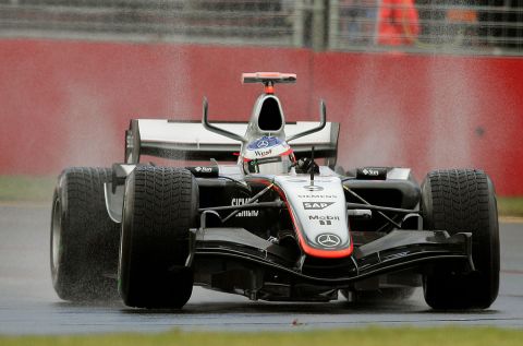 Finland's Kimi Raikkonen in action in his McLaren during the first qualifying session for the Australian Formula One Grand Prix at Melbourne's Albert Park circuit Saturday, March 5, 2005. Italy's Giancarlo Fisichella recorded the fastest time in the first of two qualifying sessions for Sunday's Australian Grand Prix. (AP Photo/Tony Feder)