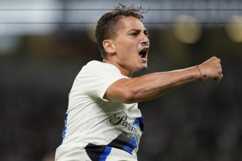 Inter Milan's Sebastiano Esposito reacts after scoring a point against PSG during the second half of a friendly soccer match in Tokyo, Tuesday, Aug. 1, 2023. (AP Photo/Hiro Komae)