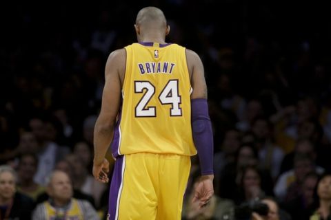 Los Angeles Lakers forward Kobe Bryant walks down the court during the first half of Bryant's last NBA basketball game, against the Utah Jazz, Wednesday, April 13, 2016, in Los Angeles. (AP Photo/Jae C. Hong)