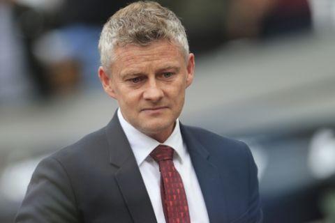Manchester United's manager Ole Gunnar Solskjaer arrives before the start of the English Premier League soccer match between West Ham and Manchester United at London stadium in London, Sunday, Sept. 22, 2019. (AP Photo/Leila Coker)