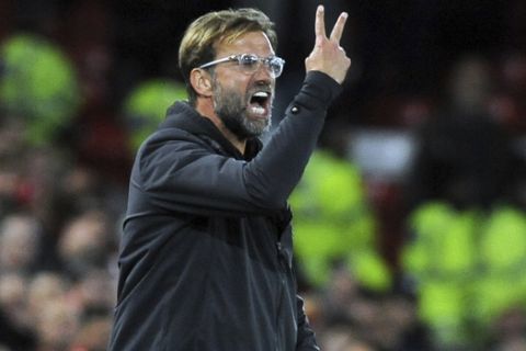 Liverpool manager Juergen Klopp reacts during the English League Cup soccer match between Liverpool and Chelsea at Anfield stadium in Liverpool, England, Wednesday, Sept. 26, 2018. (AP Photo/Rui Vieira)