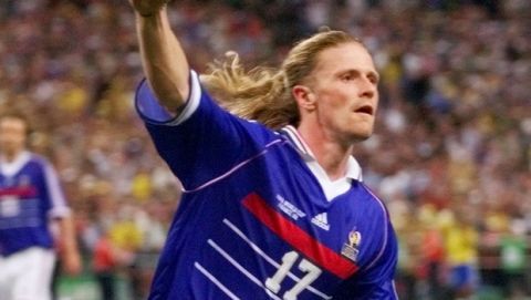 Emmanuel Petit celebrates after he scored a goal for France during the final of the soccer World Cup 98 between Brazil and France at the Stade de France in Saint Denis, north of Paris, Sunday, July 12, 1998. (AP Photo/Ricardo Mazalan)
