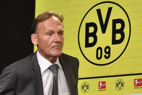 Borussia Dortmund's CEO Hans-Joachim Watzke arrives to the annual balance press conference in Dortmund, Germany, Friday, Aug. 25, 2017. The Bundesliga soccer club announced record sales of 405,69 million Euro for the past season. (AP Photo/Martin Meissner)