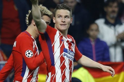 Atletico's Kevin Gameiro celebrates scoring his side's 2nd goal during a Champions League group C soccer match between Atletico Madrid and Roma at the Wanda Metropolitano stadium in Madrid, Wednesday, Nov. 22, 2017. (AP Photo/Francisco Seco)