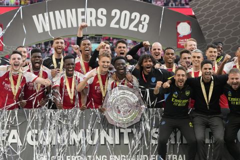 Arsenal players celebrate after winning the English FA Community Shield final soccer match between Arsenal and Manchester City at Wembley Stadium in London, Sunday, Aug. 6, 2023. (AP Photo/Kirsty Wigglesworth)