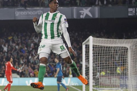 Betis' Junio, reacts after scoring against Real Madrid during La Liga soccer match between Betis and Real Madrid at the Villamarin stadium, in Seville, Spain, on Sunday, Feb. 18, 2018. (AP Photo/Miguel Morenatti)