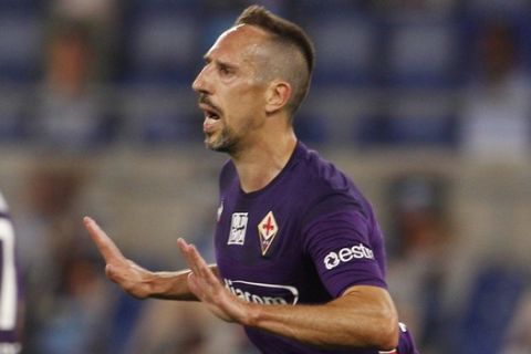 Fiorentina's Franck Ribery celebrates after scoring his side's opening goal during a Serie A soccer match between Lazio and Fiorentina at Rome's Olympic stadium, Saturday, June 27, 2020. (AP Photo/Riccardo de Luca)