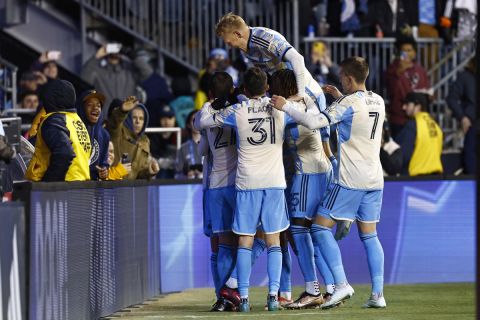 Philadelphia Union players celebrate a goal by midfielder Daniel Gazdag against the Columbus Crew during an MLS soccer match, Saturday, Feb. 25, 2023, in Chester, Pa. (AP Photo/Rich Schultz)