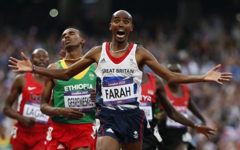 Britain's Mo Farah reacts as he wins the men's 5000m final at the London 2012 Olympic Games at the Olympic Stadium in an August 11, 2012 file photo. Farah is awarded a Commander of the Most Excellent Order of the British Empire (CBE) in the 2013 New Year Honours, it was announced on December 29, 2012. REUTERS/Lucy Nicholson/files  (BRITAIN - Tags: SPORT ATHLETICS OLYMPICS)