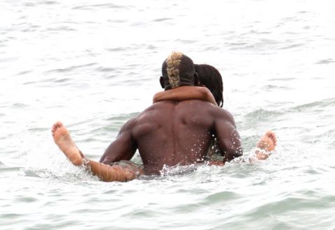 UK CLIENTS MUST CREDIT: AKM-GSI ONLY<BR/>
Italian striker Mario Balotelli and his fiancee, Belgian model Fanny Neguesha, looked madly in love while they frolicked in the ocean in Miami Beach, Miami, FL. The recently engaged couple embraced and kissed for most of the time in the water, with Mario playfully dunking Fanny in the water as he carried her.
<P>
Pictured: Mario Balotelli and Fanny Neguesha
<P><B>Ref: SPL796957  060714  </B><BR/>
Picture by: AKM-GSI / Splash News<BR/>
</P><P>
<B>Splash News and Pictures</B><BR/>
Los Angeles:	310-821-2666<BR/>
New York:	212-619-2666<BR/>
London:	870-934-2666<BR/>
photodesk@splashnews.com<BR/>
</P>