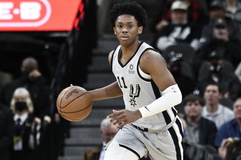 San Antonio Spurs' Josh Primo runs up the court during the second half of an NBA basketball game against the Los Angeles Clippers, Saturday, Jan. 15, 2022, in San Antonio. San Antonio won 101-94. (AP Photo/Darren Abate)
