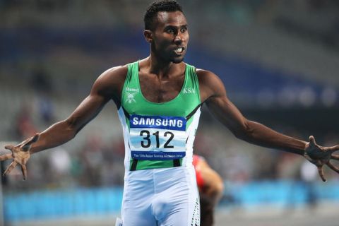 Saudi Arabia's Yousef Ahmed M Masrahi reacts after his Men's 400m Semifinal at the 17th Asian Games in Incheon, South Korea,  Saturday, Sept. 27, 2014.(AP Photo/Rob Griffith)
