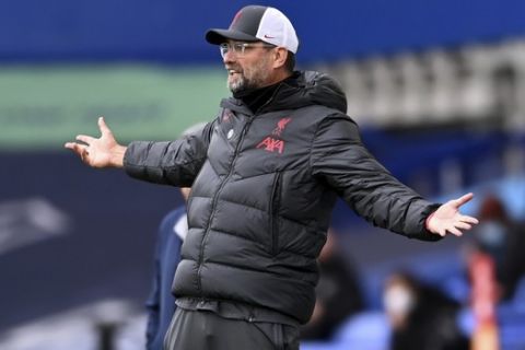 Liverpool's manager Jurgen Klopp reacts during the English Premier League soccer match between Everton and Liverpool at Goodison Park stadium, in Liverpool, England, Saturday, Oct. 17, 2020. (Laurence Griffiths/Pool via AP)