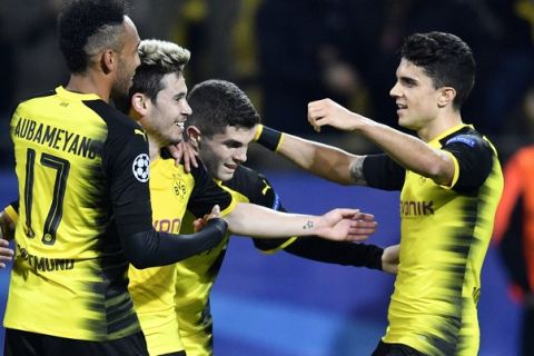 Dortmund's players celebrated a goal against APOEL Nicosia during the Champions League group H soccer match between Borussia Dortmund and APOEL Nicosia in Dortmund, Germany, Wednesday, Nov. 1, 2017. (AP Photo/Martin Meissner)