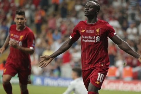 Liverpool's Sadio Mane celebrates after scoring his side's opening goal during the UEFA Super Cup soccer match between Liverpool and Chelsea, in Besiktas Park, in Istanbul, Wednesday, Aug. 14, 2019. (AP Photo)
