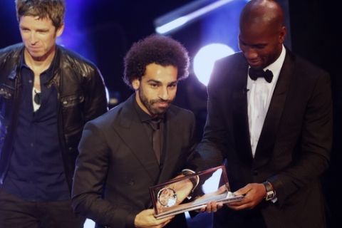 Egypt's Mohamed Salah receives the FIFA Puskas award during the ceremony of the Best FIFA Football Awards in the Royal Festival Hall in London, Britain, Monday, Sept. 24, 2018. (AP Photo/Frank Augstein)