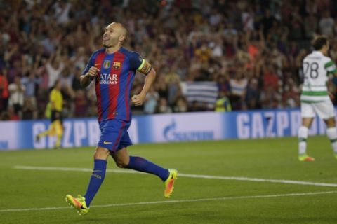 Barcelona's Andres Iniesta celebrates scoring his side's 4th goal during a Champions League, Group C soccer match between Barcelona and Celtic, at the Camp Nou stadium in Barcelona, Spain, Tuesday, Sept. 13, 2016. (AP Photo/Emilio Morenatti)