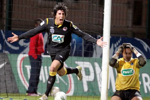 Lille's forward Gianni Bruno (C) jubilates after scoring a goal against Compiegne during the French Cup Football match on January 21, 2012 at the Pierre Brisson stadium in Beauvais. AFP/ FRANCOIS NASCIMBENI (Photo credit should read FRANCOIS NASCIMBENI/AFP/Getty Images)