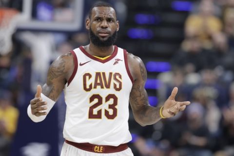 Cleveland Cavaliers' LeBron James argues a call during the first half of an NBA basketball game against the Indiana Pacers, Friday, Jan. 12, 2018, in Indianapolis. (AP Photo/Darron Cummings)