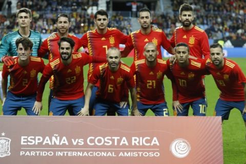 Spain national team poses for photos before the international friendly soccer match between Spain and Costa Rica in Malaga, Spain, Saturday, Nov. 11, 2017. (AP Photo/Miguel Morenatti)