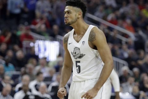 Oregon's Tyler Dorsey reacts after scoring against Arizona during the first half of an NCAA college basketball game for the championship of the Pac-12 men's tournament Saturday, March 11, 2017, in Las Vegas.(AP Photo/John Locher)