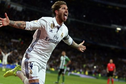 Real Madrid's Sergio Ramos celebrates after scoring his side's second goal against Real Betis during a Spanish La Liga soccer match between Real Madrid and Real Betis at the Santiago Bernabeu stadium in Madrid, Sunday, March 12, 2017. (AP Photo/Francisco Seco)