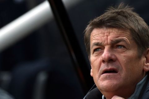 Newcastle United's head coach John Carver awaits the start of  their English Premier League soccer match between Newcastle United and West Bromwich Albion at St James' Park, Newcastle, England, Saturday, May 9, 2015. (AP Photo/Scott Heppell)