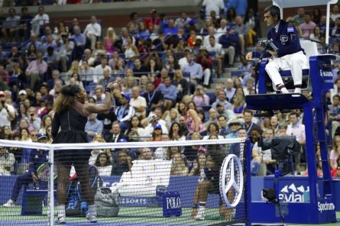 Serena Williams argues with chair umpire Carlos Ramos during a match against Naomi Osaka, of Japan, in the women's final of the U.S. Open tennis tournament, Saturday, Sept. 8, 2018, in New York. (AP Photo/Julio Cortez)