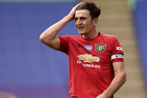 Manchester United's Harry Maguire reacts during the English Premier League soccer match between Leicester City and Manchester United at the King Power Stadium, in Leicester, England, Sunday, July 26, 2020. (Oli Scarff/Pool via AP)