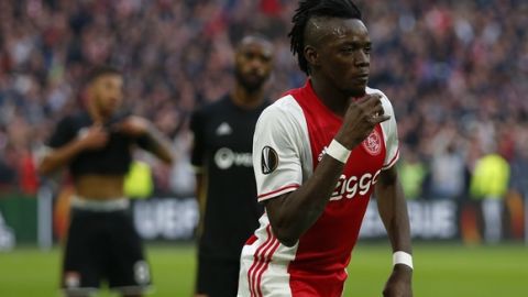 Ajax's Bertrand Traore (9) celebrates after scoring the fourth goal of his team during the first leg semi final soccer match between Ajax and Olympique Lyon in the Amsterdam ArenA stadium, Netherlands, Wednesday, May 3, 2017. (AP Photo/Peter Dejong)