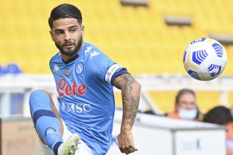 Napoli's Lorenzo Insigne controls the ball during the Serie A soccer match between Parma and Napoli at the Ennio Tardini stadium in Parma Sunday, Sept. 20, 2020. (Massimo Paolone/LaPresse via AP)