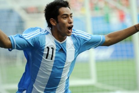 Argentinian Sergio Araujo celebrates after scoring in their preliminary football match against Brazil during the XVI Pan American Games in Guadalajara, Mexicoon October 19, 2011 . AFP PHOTO/ Hector Guerrero (Photo credit should read HECTOR GUERRERO/AFP/Getty Images)
