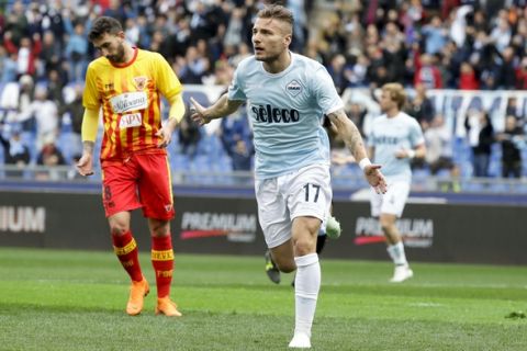 Lazio's Ciro Immobile celebrates after scoring during a Serie A soccer match between Lazio and Benevento, at Rome's Olympic Stadium, Saturday, March 31, 2018. (AP Photo/Andrew Medichini)