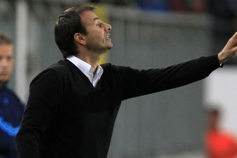 Serbia's FK Partizan Belgrade coach Aleksandar Stanojevic reacts during the play-off's, second leg, of the Champions League against Belgium's RSC Anderlecht, in Brussels, Belgium, Tuesday Aug. 24, 2010. (AP Photo/Yves Logghe)