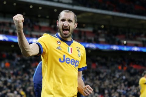 Juventus' Giorgio Chiellini celebrates at the end of a the Champions League, round of 16, second-leg soccer match between Juventus and Tottenham Hotspur, at the Wembley Stadium in London, Wednesday, March 7, 2018. Juventus won 2-1. (AP Photo/Frank Augstein))