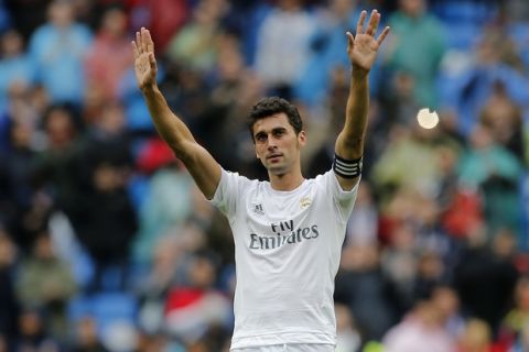 Real Madrid's Alvaro Arbeloa responds to fans applause after playing his last match for the team during a Spanish La Liga soccer match between Real Madrid and Valencia at the Santiago Bernabeu stadium in Madrid, Spain, Sunday, May 8, 2016. (AP Photo/Paul White)

