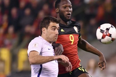 Belgium's Romelu Lukaku, right, goes after the ball during the Euro 2018 Group H qualifying match between Belgium and Greece at the King Baudouin stadium in Brussels on Saturday, March 25, 2017. (AP Photo/Geert Vanden Wijngaert)