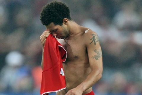 Liverpool's Jermaine Pennant leaves the field at the end of the Champions League Final soccer match between AC Milan and Liverpool at the Olympic Stadium in Athens Wednesday May 23, 2007. Liverpool lost 1-2. (AP Photo/Jon Super)