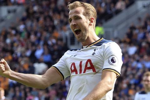 Tottenham Hotspur's Harry Kane celebrates scoring his side's third goal against Hull City during the English Premier League soccer match at the KCOM Stadium, Hull, England, Sunday May 21, 2017. (Danny Lawson/PA via AP)