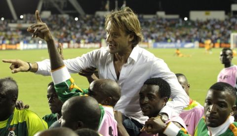 Zambia's coach Herve Renard is carried by players after winning their African Cup of Nations final soccer match against Ivory Coast at the Stade de l'Amitie in Libreville, Gabon, Sunday Feb. 12, 2012.  (AP Photo/Themba Hadebe)